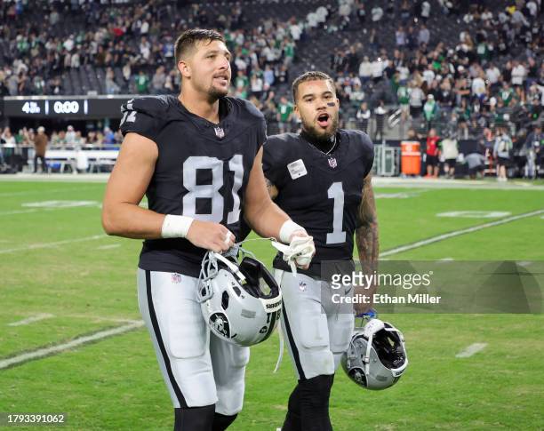 Tight end Austin Hooper and safety Marcus Epps of the Las Vegas Raiders leave the field after the Raiders' 16-12 victory over the New York Jets at...