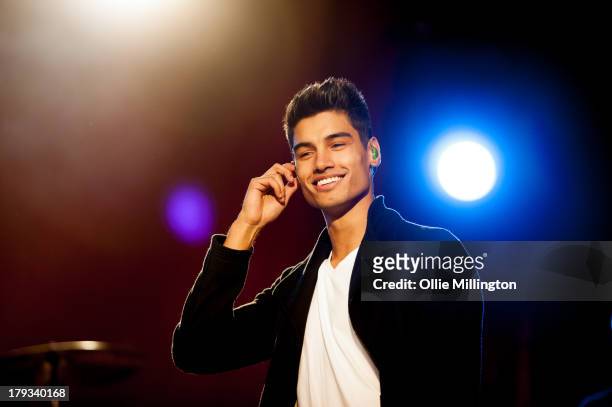 Siva Kaneswaran of The Wanted performs on stage on Day 2 of Fusion Festival 2013 at Cofton Park on September 1, 2013 in Birmingham, England.