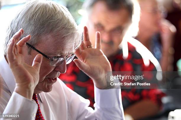 Australian Prime Minister, Kevin Rudd looks on at Bramble Bay Bowls Club on September 2, 2013 in Woody Point, Australia. According to the News...