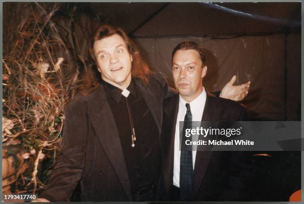 Singer Meat Loaf and actor Tim Curry at event, circa 1995.