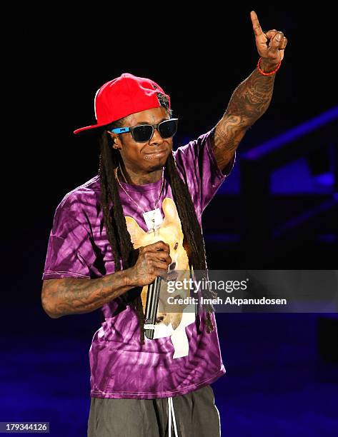 Rapper Lil Wayne performs during the 2013 America's Most Wanted Musical Festival at Verizon Wireless Amphitheatre on September 1, 2013 in Laguna...