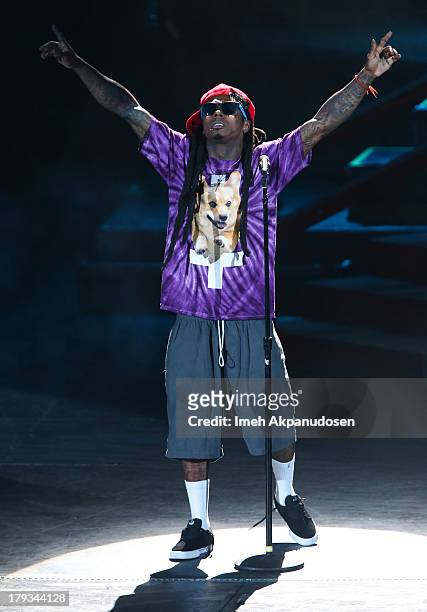 Rapper Lil Wayne performs during the 2013 America's Most Wanted Musical Festival at Verizon Wireless Amphitheatre on September 1, 2013 in Laguna...