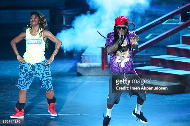 Rapper Lil Wayne performs during the 2013 America's Most Wanted Musical Festival at Verizon Wireless Amphitheatre on September 1, 2013 in Laguna...