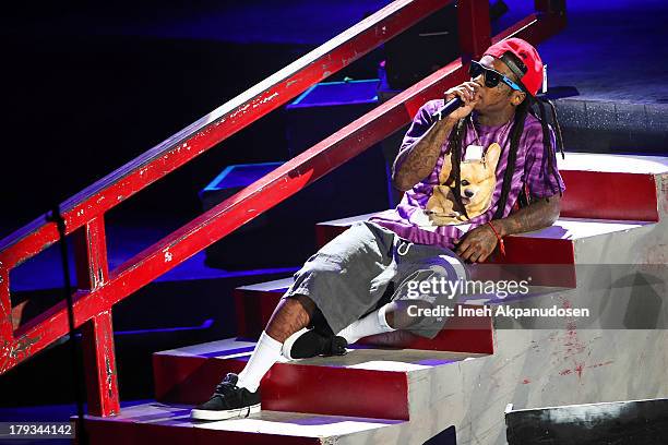 Rapper Lil Wayne performs during the 2013 America's Most Wanted Musical Festival at Verizon Wireless Amphitheatre on September 1, 2013 in Laguna...