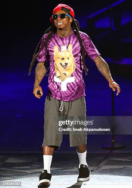 Rapper Lil Wayne performs during the 2013 America's Most Wanted Musical Festival at Verizon Wireless Amphitheatre on September 1, 2013 in Laguna...