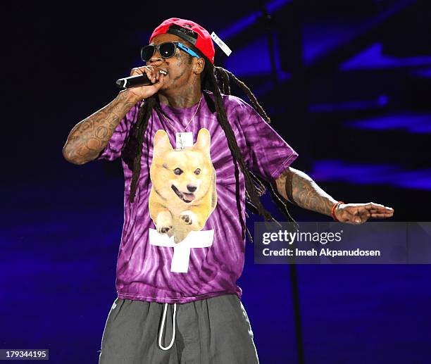 Rapper Lil Wayne performs during the 2013 America's Most Wanted Musical Festival at Verizon Wireless Amphitheatre on September 1, 2013 in Laguna...