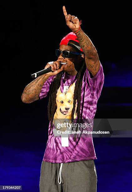 Rapper Lil Wayne performs during the 2013 America's Most Wanted Musical Festival at Verizon Wireless Amphitheatre on September 1, 2013 in Laguna...