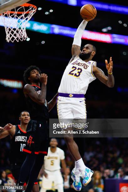 Los Angeles Lakers forward LeBron James goes up for a dunk past Houston Rockets forward Tari Eason during the second half at Crypto.com Arena on...