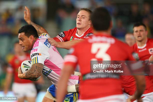 Reni Maitua of the Ees makes a break during a round 25 NRL match between the Parramatta Eels and the St George Illawarra Dragons at Parramatta...