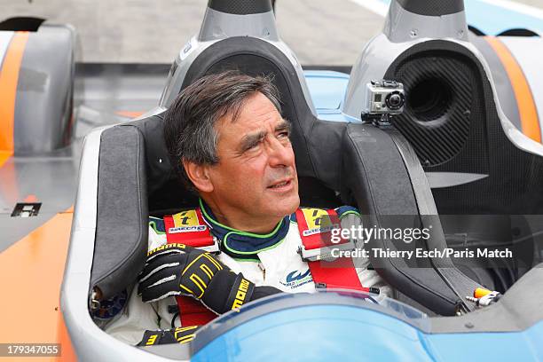 Lawyer, politician and former French prime minister,Francois Fillon a motor sport enthusiast is photographed for Paris Match on August 24, 2013 in Le...