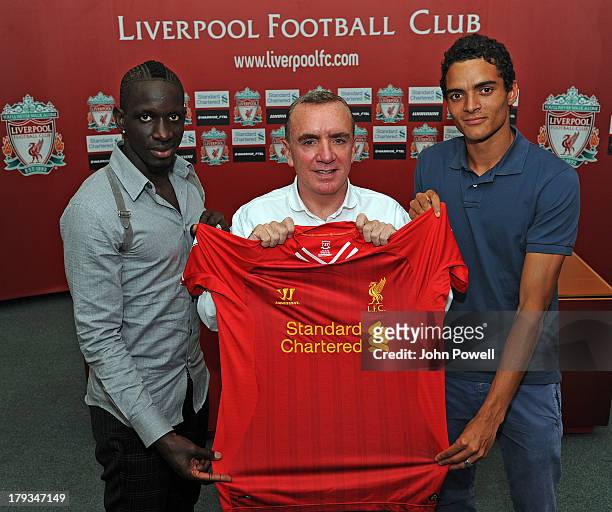 Mamadou Sakho and Tiago Ilori sign a contract for Liverpool Football Club with Managing Director Ian Ayre, at Melwood Training Ground on August 31,...