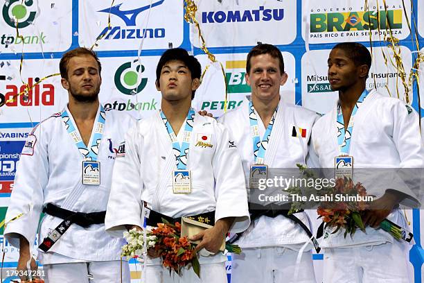 Gold medalist Shohei Ono of Japan, Silver medalist Ugo Legrand of France, Bronze medalists Dex Elmont of the Netherlands and Dirk Van Tichelt of...