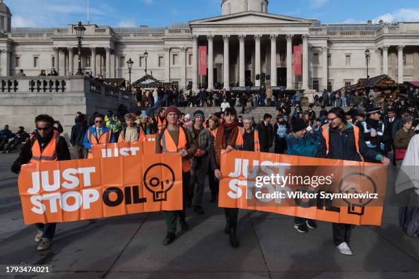 Environmental activists from Just Stop Oil slow march from Trafalgar Square in central London as they continue their latest round of protest actions...