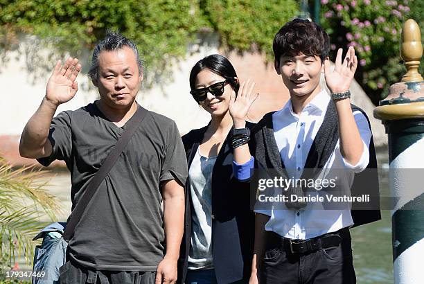 Kim Ki-duk, Lee Eun-Woo and Seo Young-Ju is seen during the 70th Venice International Film Festival on September 2, 2013 in Venice, Italy.