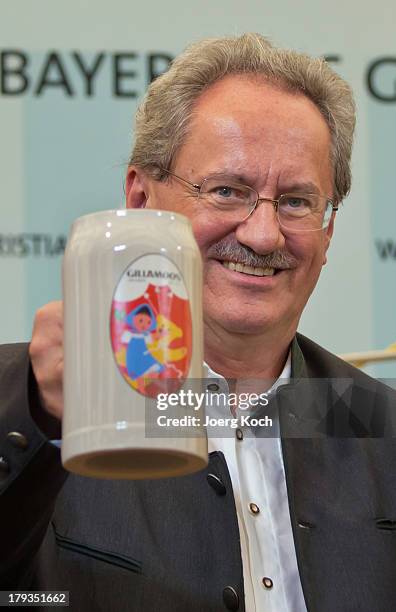 Christian Ude , social democrats candidate for the bavarian election, proposes a toast with supporters at the annual Gillamoos beer tent day of...