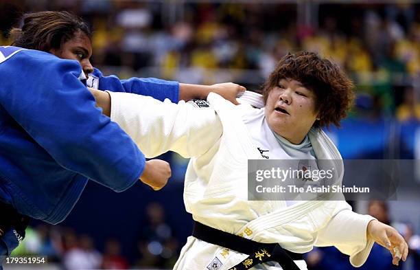 Megumi tachimoto of Japan and Maria Suelen Altheman of brazil compete in the Women's Team competition during day seven of the IJF World Judo...