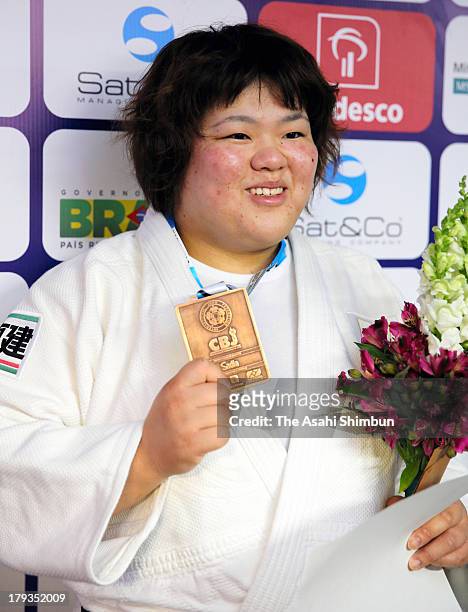 Megumi Tachimoto of Japan poses on the podium after winning the bronze medal in the Women's 78kg during day six of the IJF World Judo Championship at...