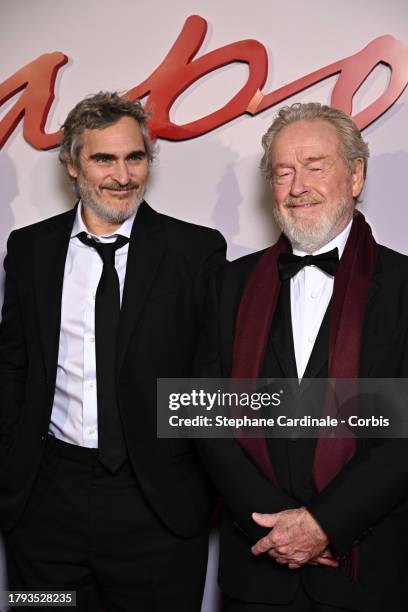 Joaquin Phoenix and Ridley Scott attend the "Napoleon" World Premiere at Salle Pleyel on November 14, 2023 in Paris, France.