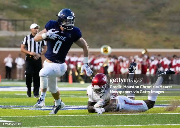 Rice Owls running back Dean Connors runs the ball during the second quarter of an NCAA college football game at Rice Stadium, Saturday, Sept. 9 in...