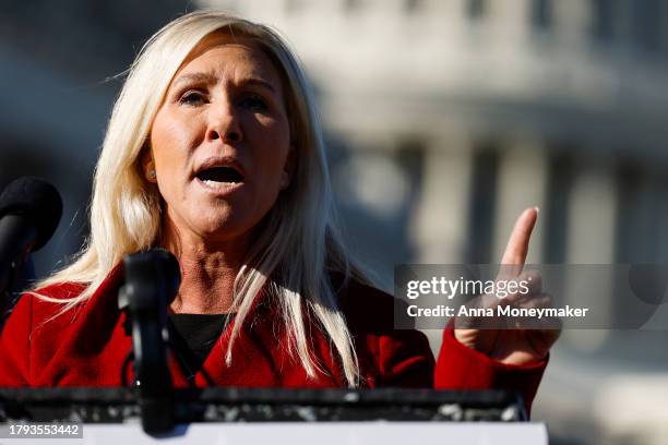 Rep. Marjorie Taylor Greene speaks alongside U.S. Rep. Tony Gonzales at a news conference on border security outside of the U.S. Capitol Building on...