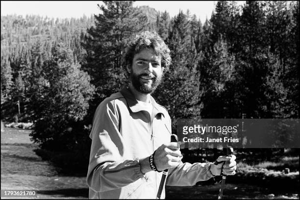 Portrait of American Olympic athlete Glenn Jobe Jr as he poses with ski poles, Northern California, August 1979. He competed in the 1980 Lake Placid...