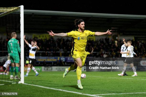 Cole Stockton of Burton Albion celebrates scoring a goal that is later disallowed during the Emirates FA Cup First Round Replay match between Burton...