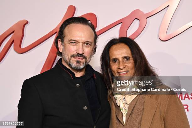 Vincent Perez and Karine Silla attend the "Napoleon" World Premiere at Salle Pleyel on November 14, 2023 in Paris, France.