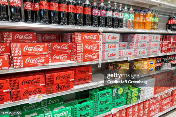 Miami Beach, Florida, Publix grocery store, Coca Cola, Sprite, soda bottles and 12 packs on shelf.