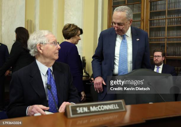 Senate Minority Leader Mitch McConnell and Senate Majority Leader Charles Schumer arrive for a Rules Committee hearing at the Russell Senate Office...