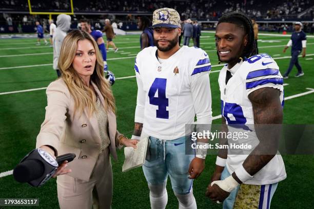 CeeDee Lamb and Dak Prescott of the Dallas Cowboys are interviewed by Erin Andrews after the game against the New York Giants at AT&T Stadium on...