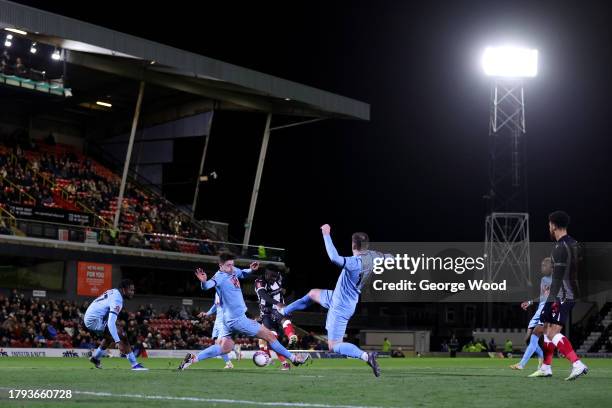 Arthur Gnahoua of Grimsby Town scores the team's fourth goal during the Emirates FA Cup First Round Replay match between Grimsby Town and Slough Town...