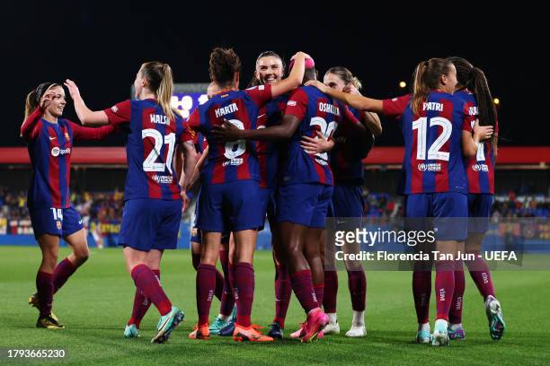 Asisat Oshoala of FC Barcelona celebrates with teammates after scoring the team's fifth goal during the UEFA Women's Champions League group stage...