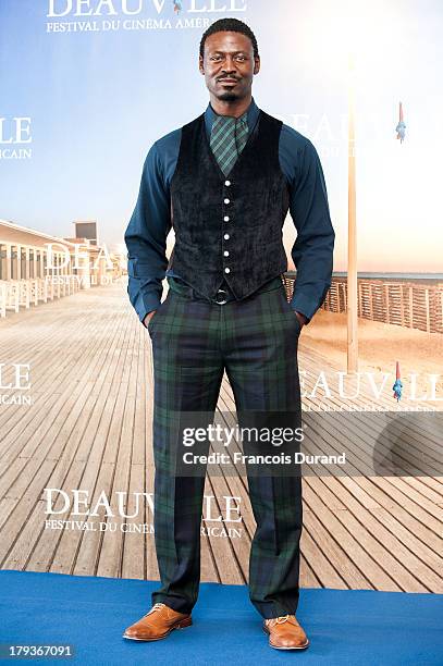 Tishuan Scott poses at a photocall for the movie 'The Retrieval' during the 39th Deauville American film festival on September 2, 2013 in Deauville,...