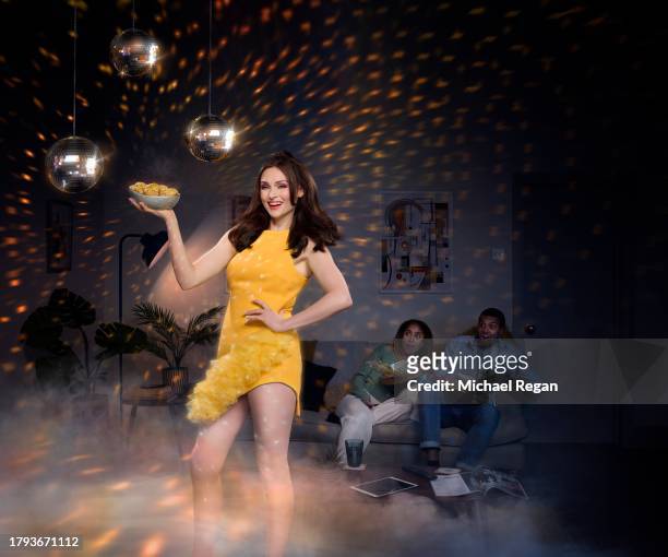 In this image released on November 21 Sophie Ellis-Bextor saves a couple from a boring dinner in a new campaign to launch McCain Baby Hasselbacks as...