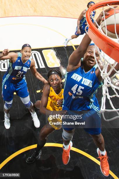 Kara Braxton of the New York Liberty shoots against Tiffany Jackson-Jones of the Tulsa Shock during the WNBA game on September 1, 2013 at the BOK...