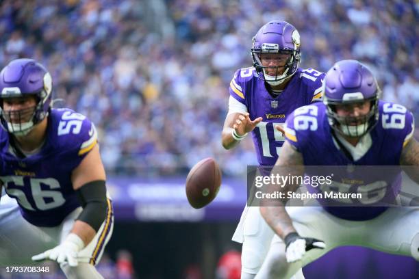 Joshua Dobbs of the Minnesota Vikings takes the snap in the second quarter of the game against the New Orleans Saints at U.S. Bank Stadium on...