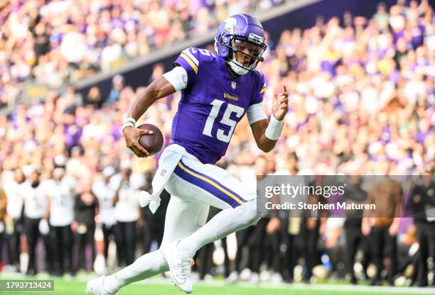 Joshua Dobbs of the Minnesota Vikings runs with the ball for a touchdown in the second quarter of the game against the New Orleans Saints at U.S....