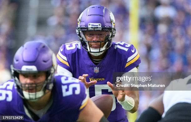 Joshua Dobbs of the Minnesota Vikings takes the snap in the second quarter of the game against the New Orleans Saints at U.S. Bank Stadium on...