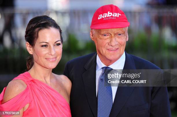 Austrian former Formula 1 racing driver Niki Lauda and his wife Birgit attend the world premiere of Rush in central London on September 2, 2013. Set...