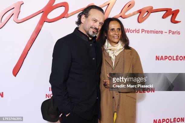 Vincent Perez and Karine Silla attend the "Napoleon" World Premiere at Salle Pleyel on November 14, 2023 in Paris, France.