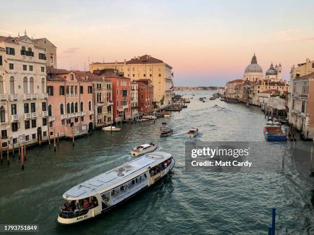 Boats travel along a canal on September 30, 2023 in Venice, Italy. Venice is among Europe's top tourist destinations. However, recently UNESCO...