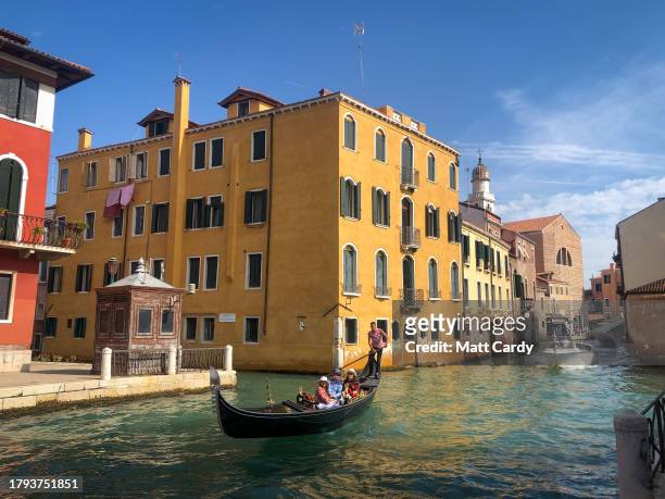 Boats travel along a canal on September 30, 2023 in Venice, Italy. Venice is among Europe's top tourist destinations. However, recently UNESCO...