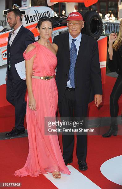 Niki Lauda and Birgit Lauda attend the World Premiere of "Rush" at Odeon Leicester Square on September 2, 2013 in London, England.