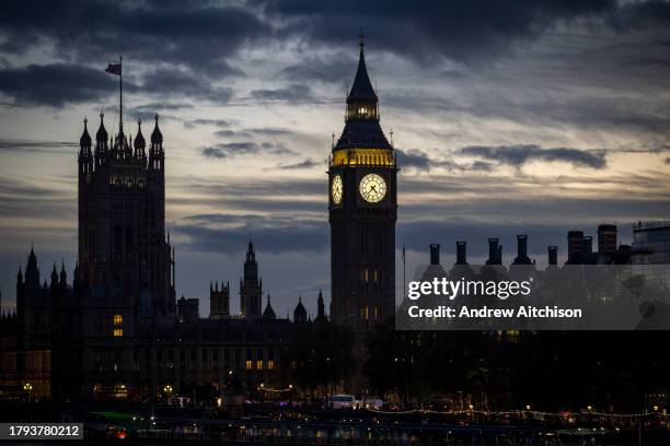 Dusk over Big Ben and the Palace of Westminster, also known as the Houses of Parliament or the House of Commons on the 15th of November 2023 in...