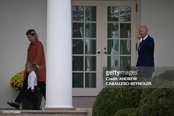 President Joe Biden's grandchildren Maisy Biden and Beau Biden, son of Hunter Biden, walk with Biden towards the Oval Office after the annual...