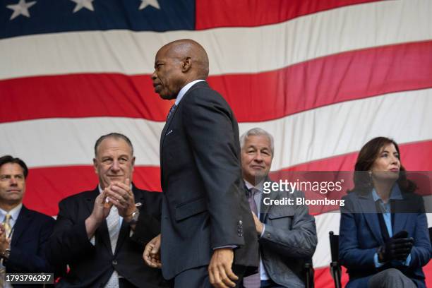 Eric Adams, mayor of New York, center, Jamie Dimon, chief executive officer of JPMorgan Chase & Co., second right, and Kathy Hochul, governor of New...