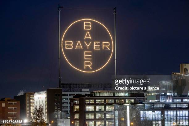 November 2023, NoW, Cologne: The Bayer Cross, the company's logo, shines on the Bayer site in Leverkusen. Bayer has discontinued a study with an...