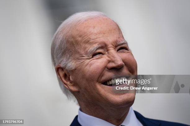 President Joe Biden delivers remarks before pardoning the National Thanksgiving turkeys Liberty and Bell during a ceremony on the South Lawn of the...