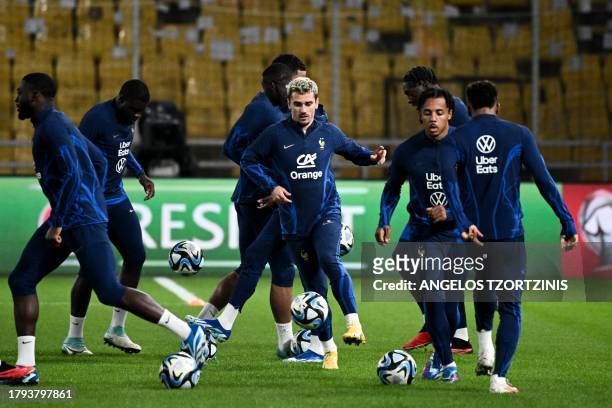 France's forward Antoine Griezmann takes part in a training session at the Agia Sophia Stadium in Athens on November 20 on the eve of the UEFA Euro...