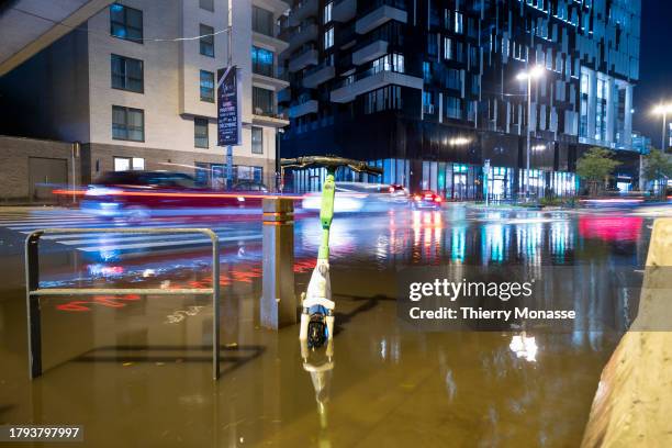 Cars pass through puddles after the rain on the Chaussée d'Etterbeek on November 20, 2023 in Brussels, Belgium. This Monday marked the return of rain...